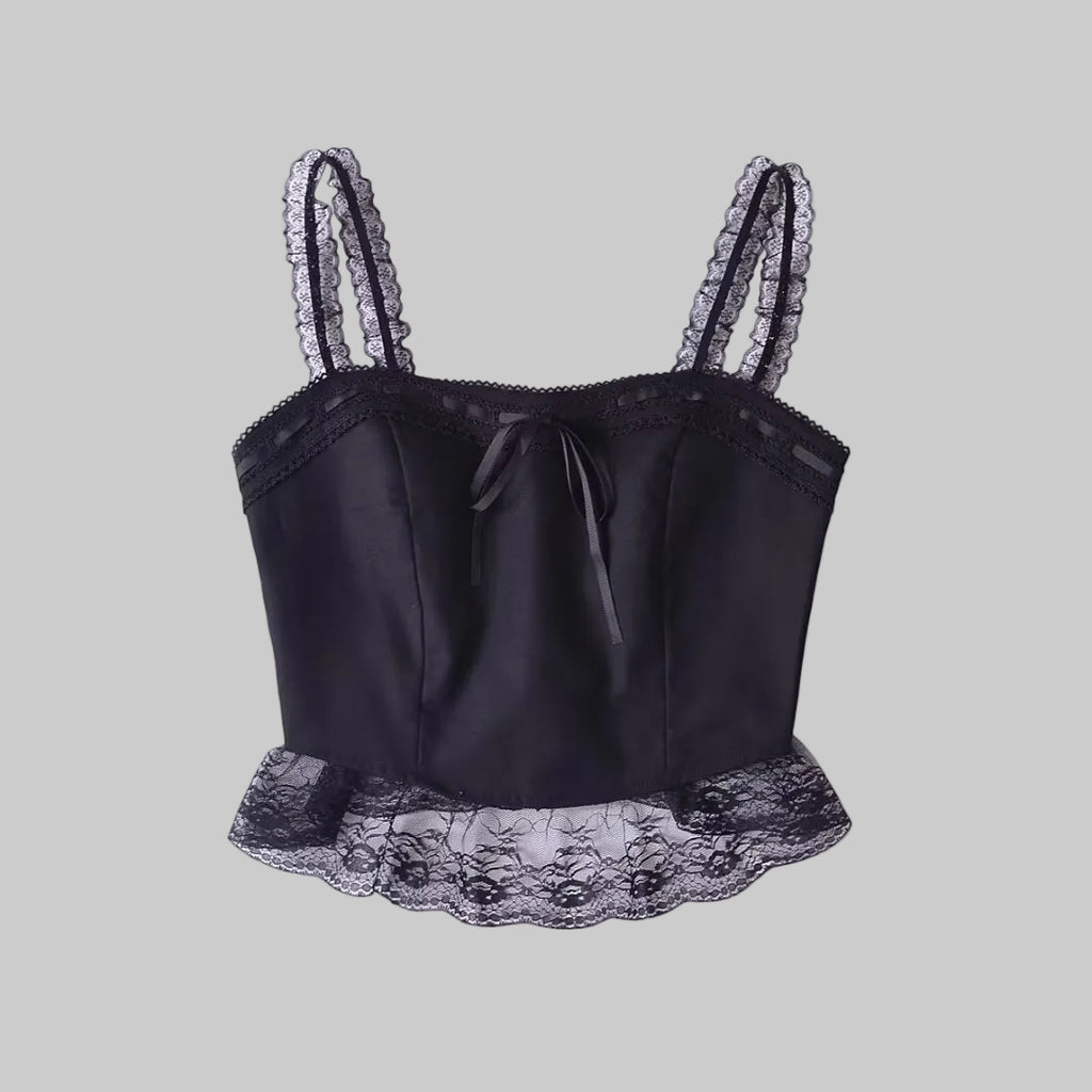 Black satin camisole with lace trim on a white background