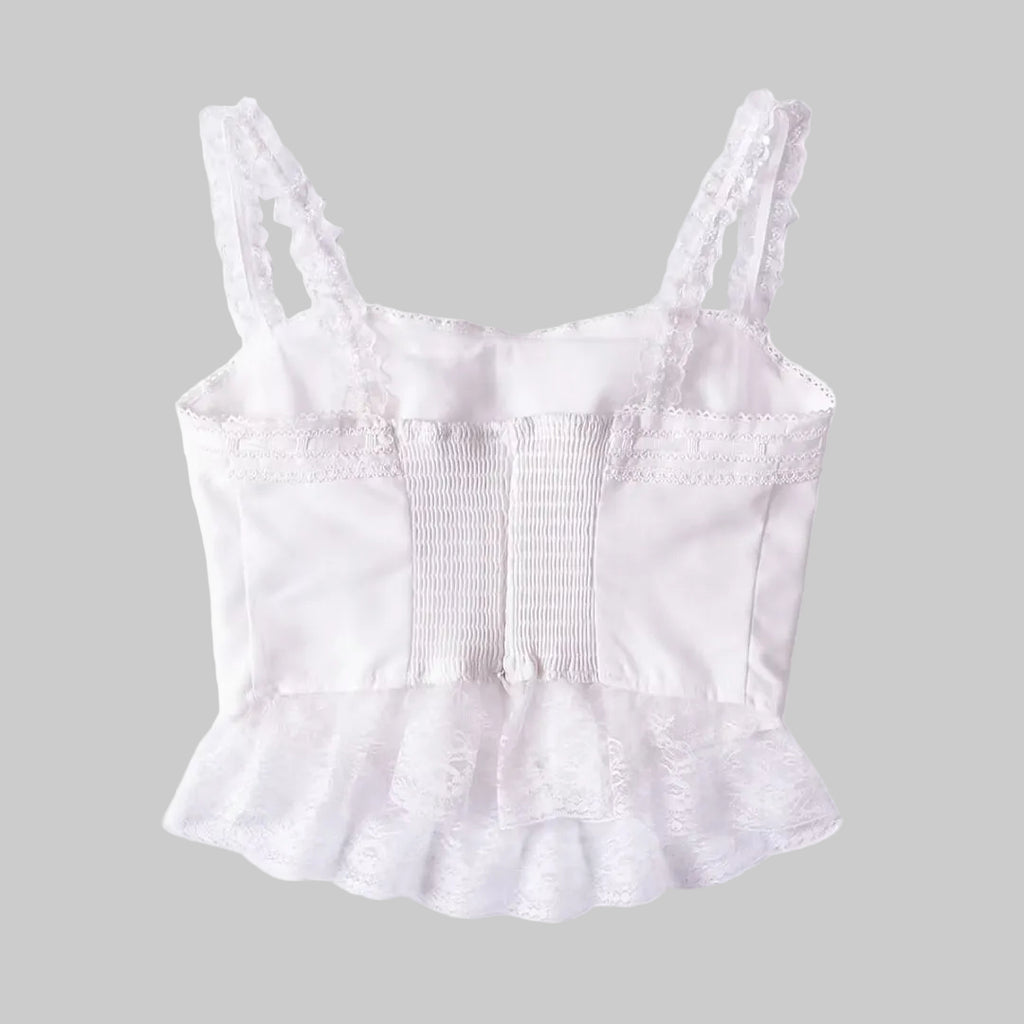 White lace crop top on a white background