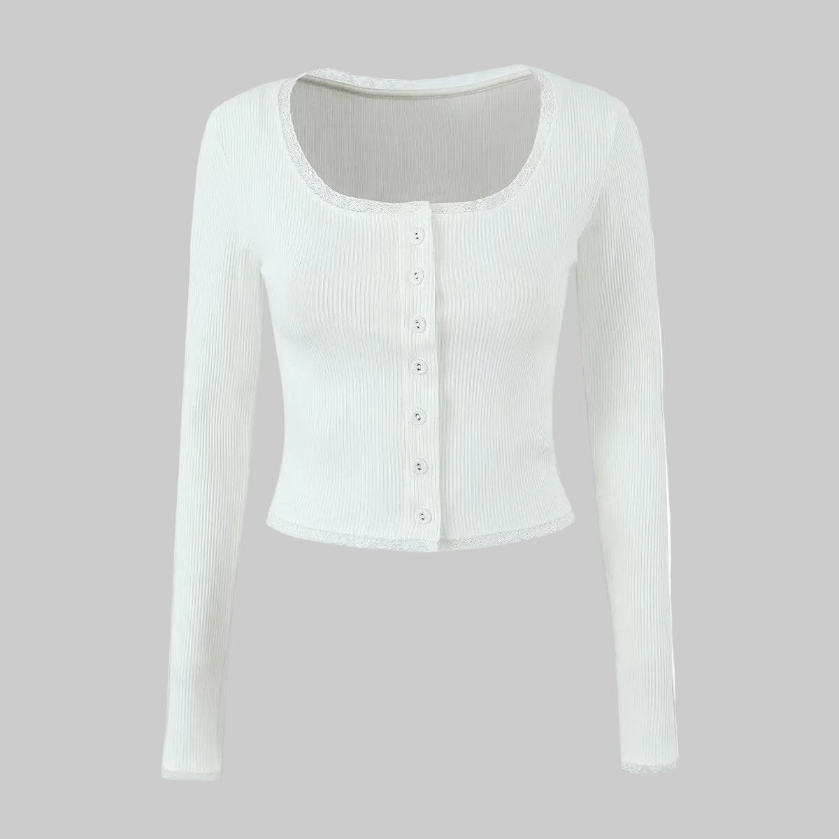 White long-sleeve button-up shirt on a white background