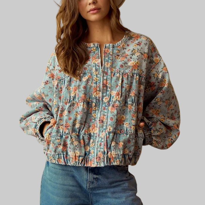 Woman wearing a floral blouse with a beige background