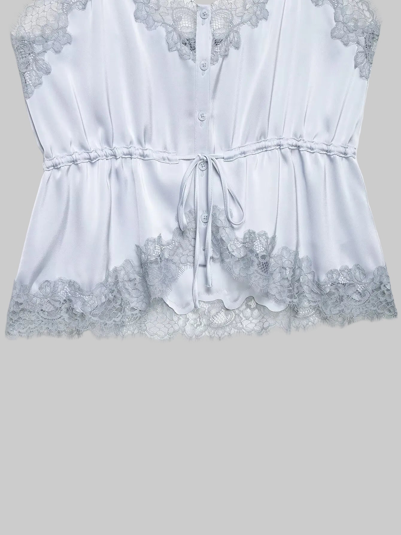 White lace top on a white background