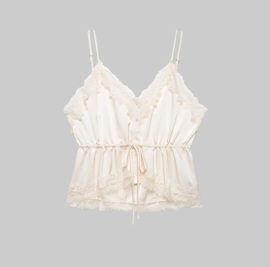 Beige lace top on a white background