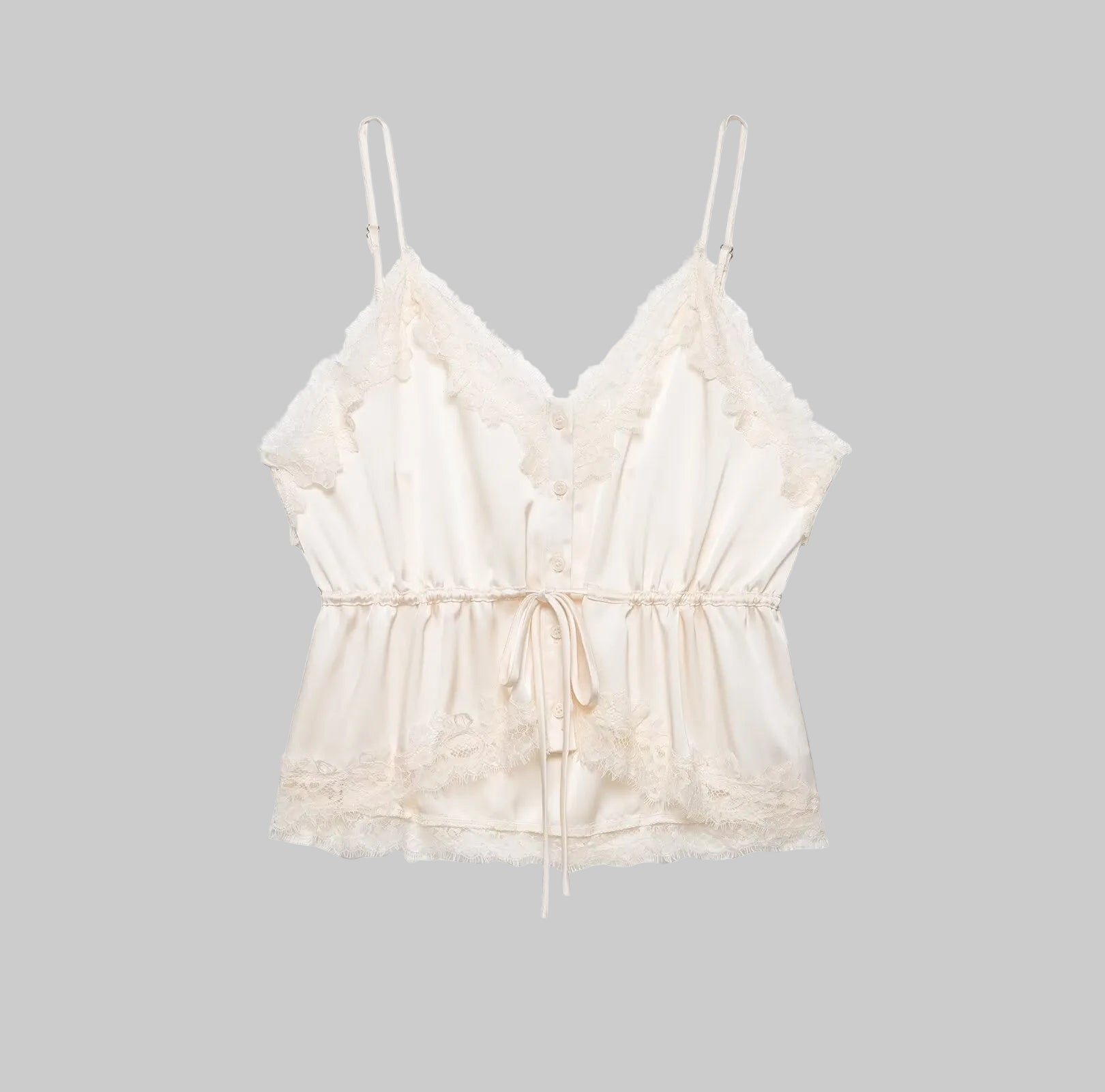 Beige lace top on a white background