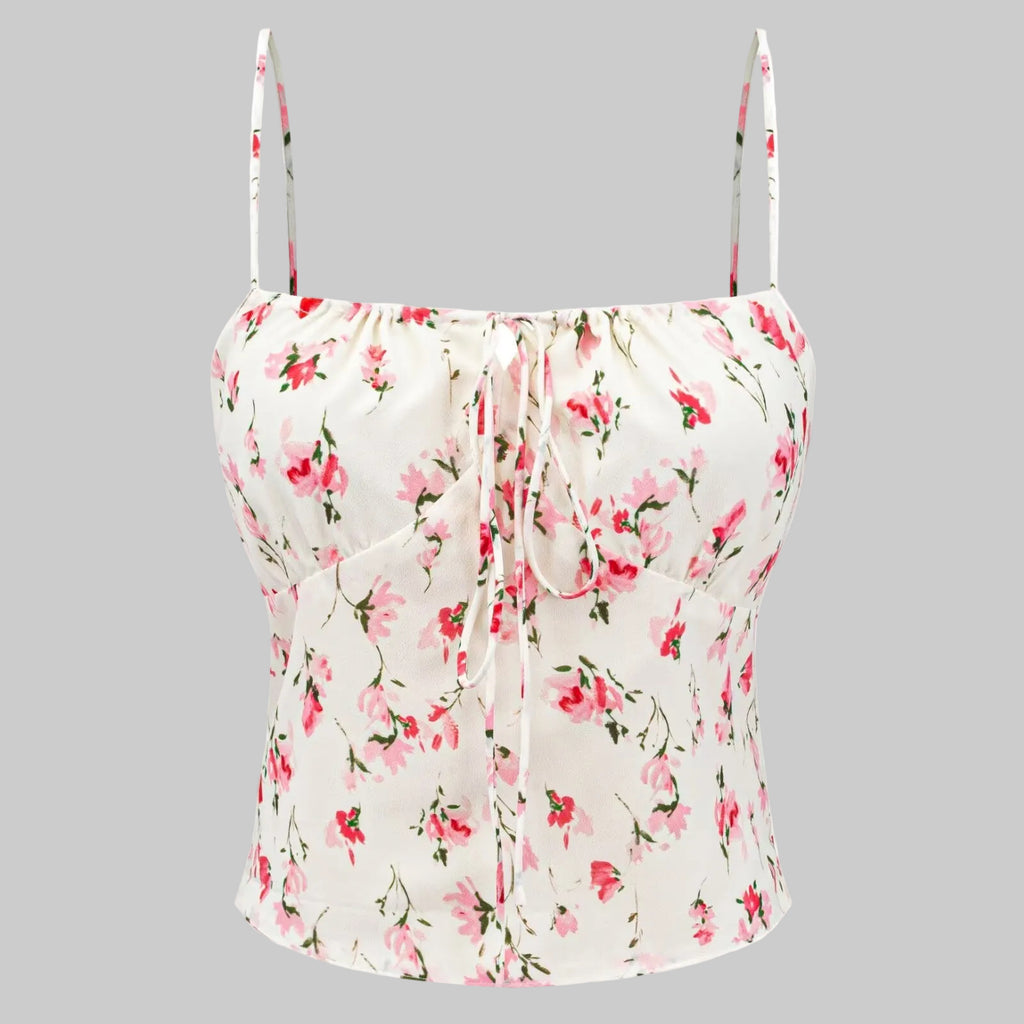 Floral print top with thin straps on a white background