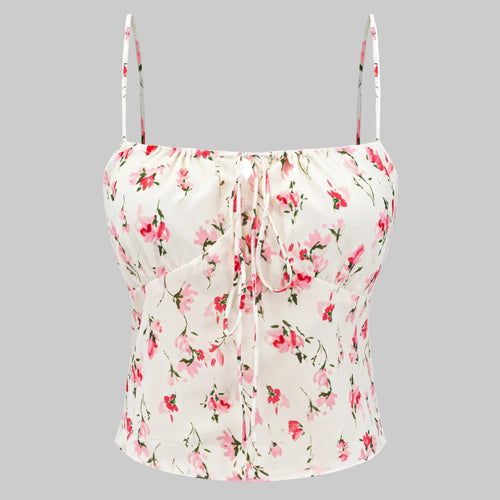 Floral print top with thin straps on a white background