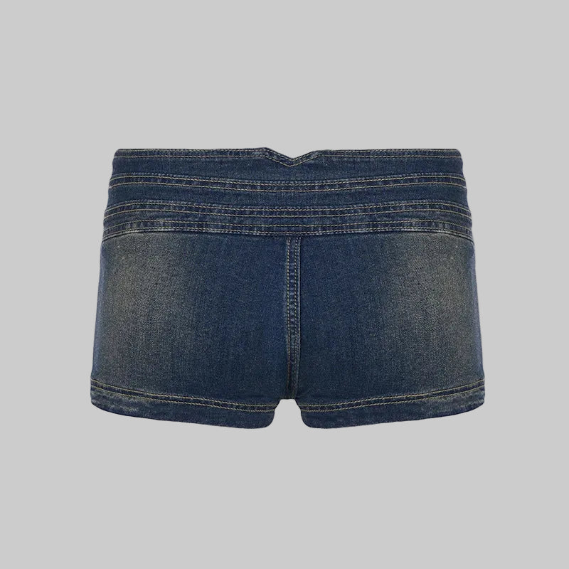 Blue denim shorts on a white background