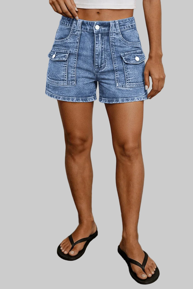 Person wearing blue denim shorts against a neutral background