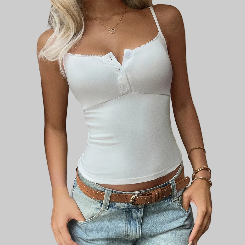 Person wearing a white tank top and blue jeans with a brown belt.