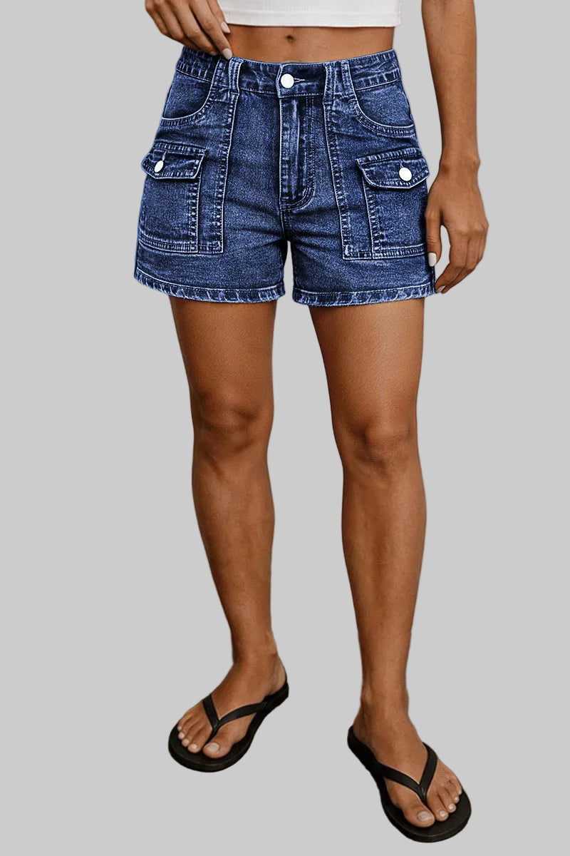 Person wearing blue denim shorts against a neutral background