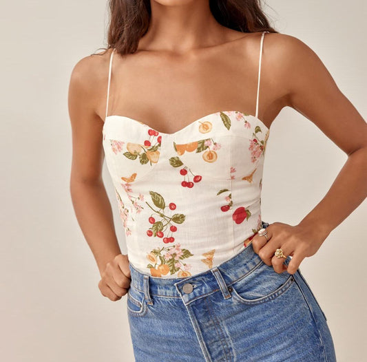 Floral printed backless tube top with sweetheart neckline and elastic fit.