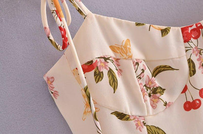 Floral printed elastic tube top with sweetheart neckline and backless design.
